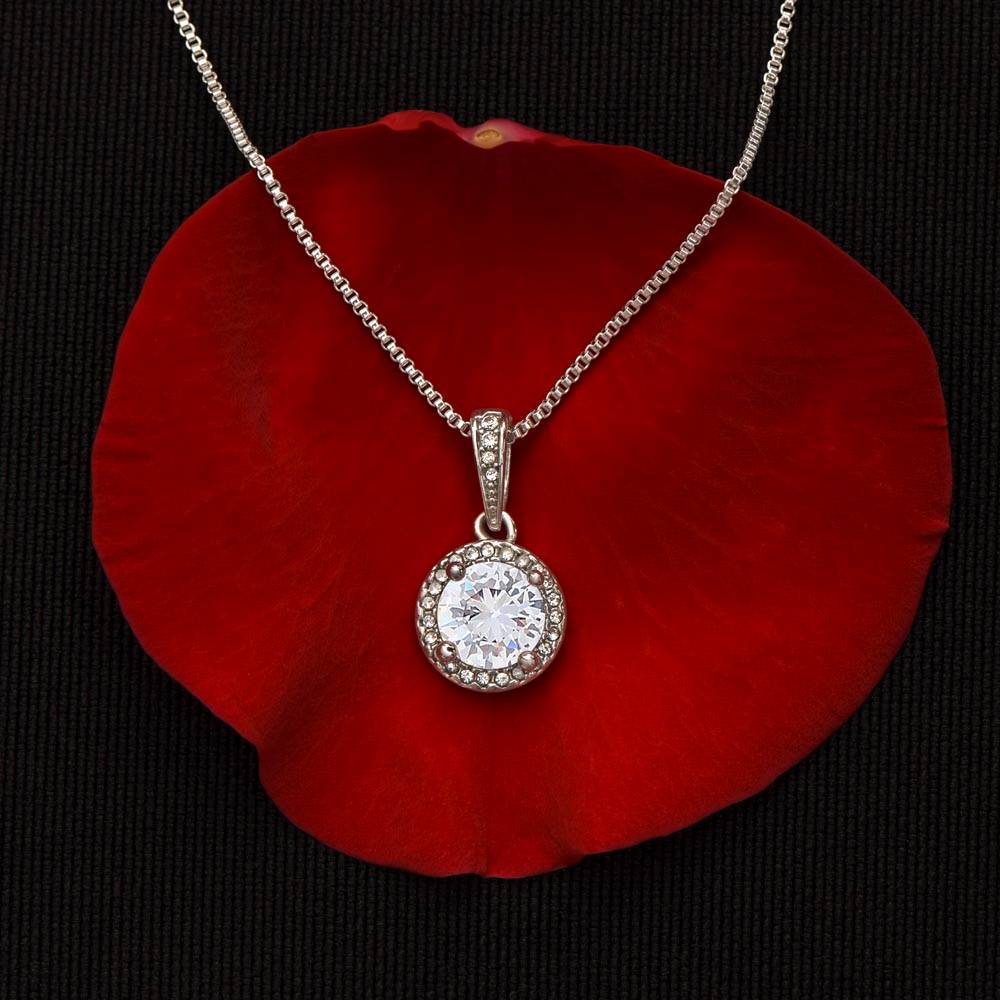 Silver-tone round halo pendant necklace with clear cubic zirconia center stone