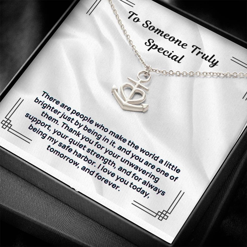 Silver anchor-and-heart pendant necklace with chain, gift-ready box display