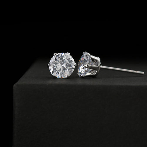Round and marquise-cut cubic zirconia stud earrings, clear stones, silver-tone posts