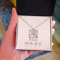 Personalized name monogram necklace with silver-tone pendant in jewelry box