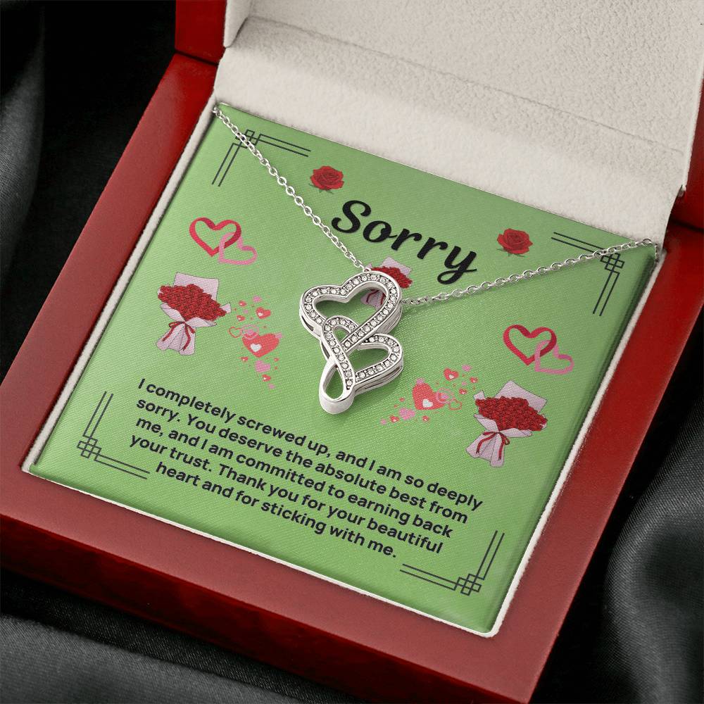 Heart infinity pendant necklace with silver-tone chain in green card within red gift box