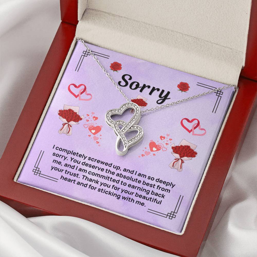 Purple apology card necklace close-up in red presentation box, heart pendant pendant