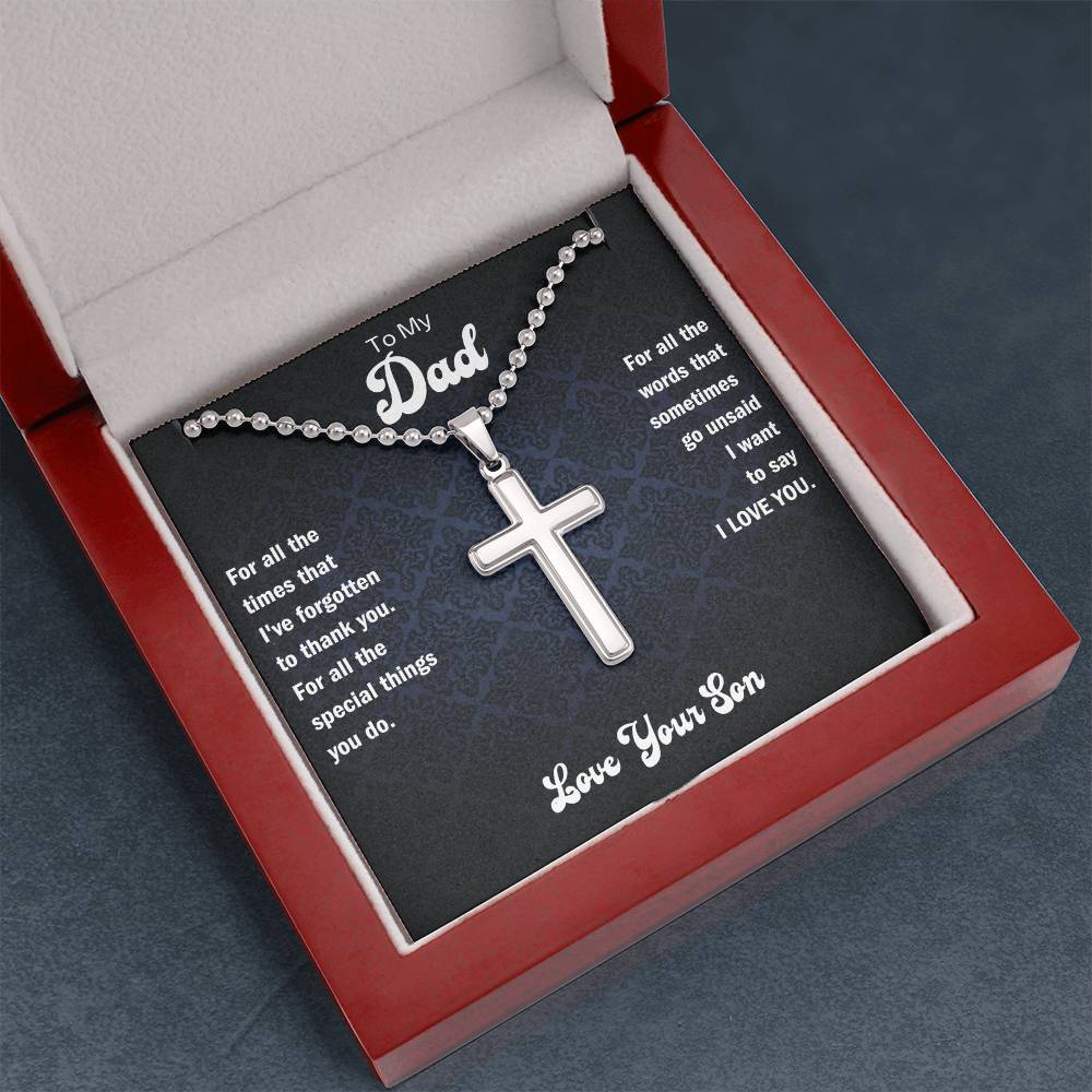 Cross pendant necklace shown in an open red gift box with message card