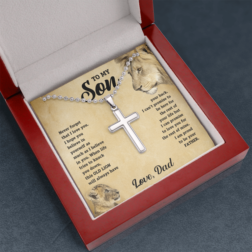 Cross pendant necklace with lion message card inside red open gift box