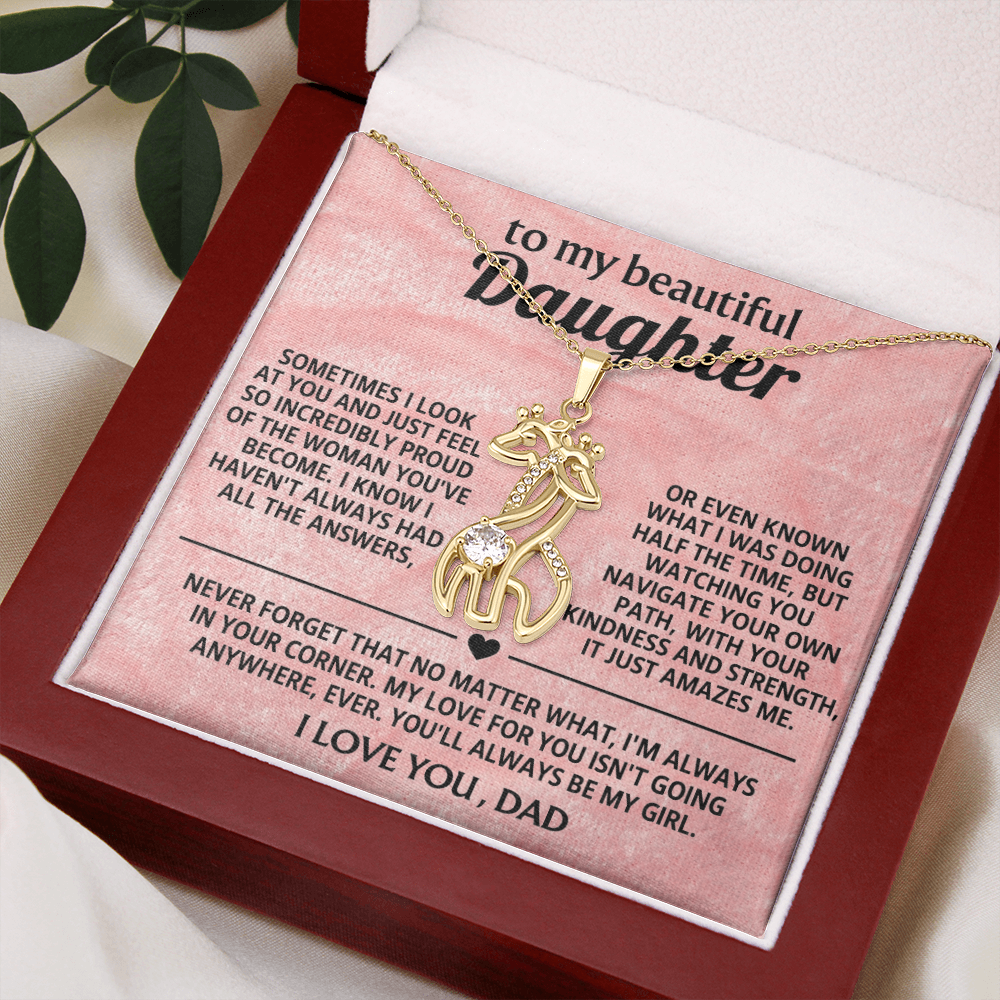 Gold-tone giraffe pendant necklace with cubic zirconia, heart-shaped accents