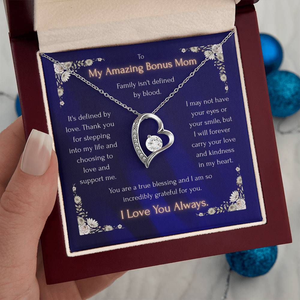 Blue heart pendant necklace in a red gift box, silver-toned heart with crystals