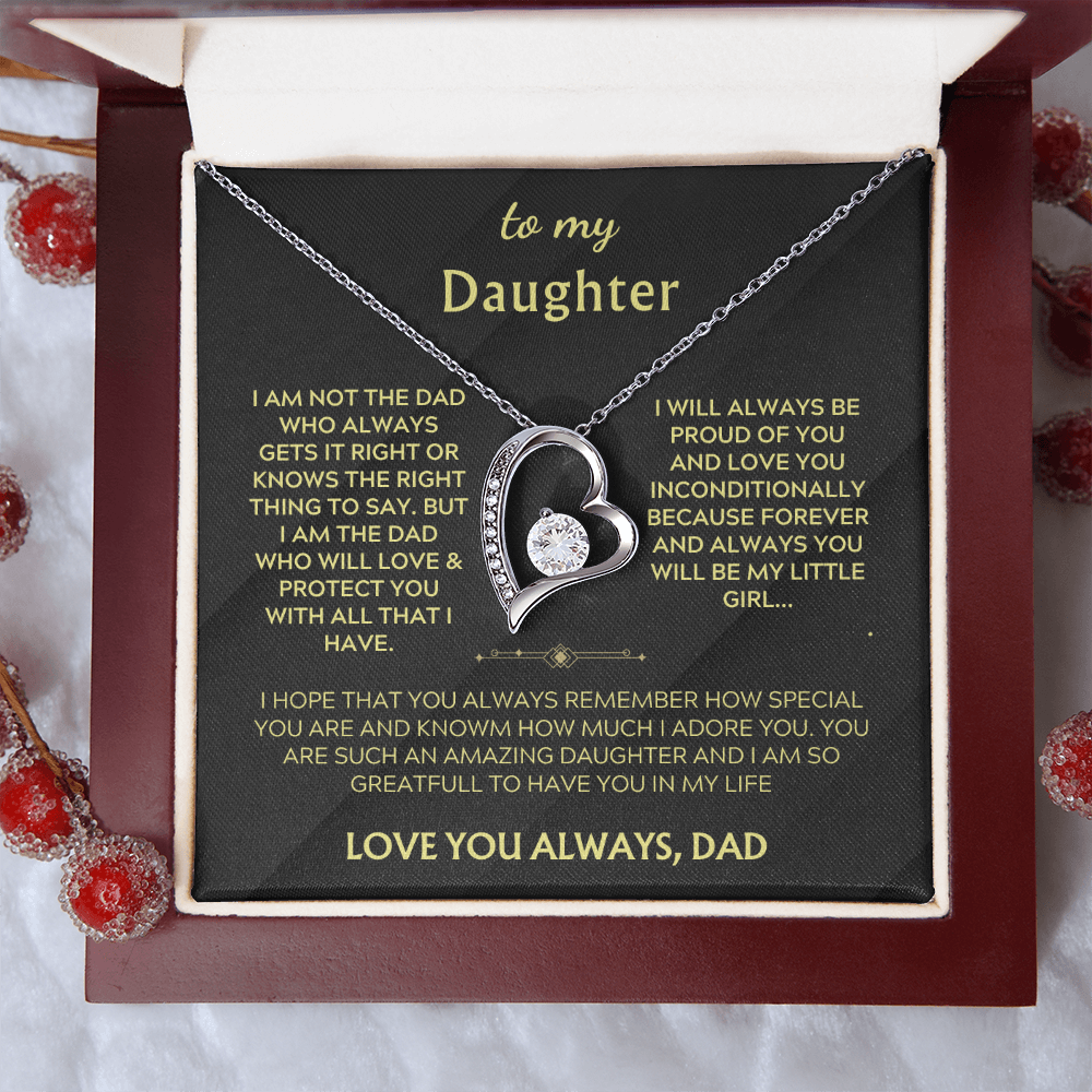Silver heart pendant necklace with crystal heart on black card inside red gift box