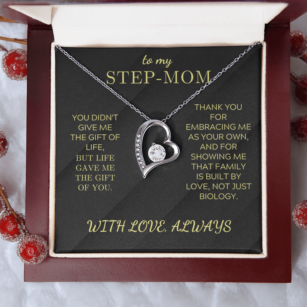 Silver heart pendant necklace in open gift box with chain