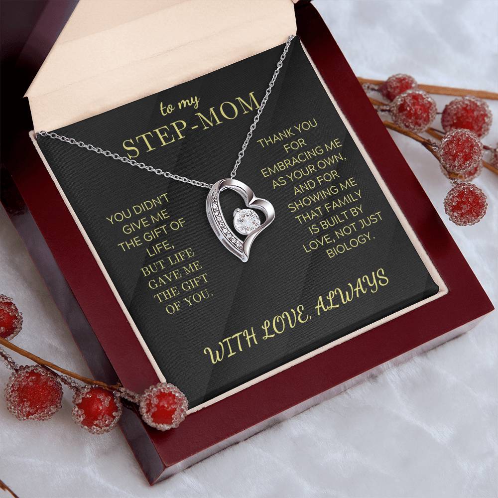 Heart pendant necklace with white gold tone finish and round zirconia charm on card