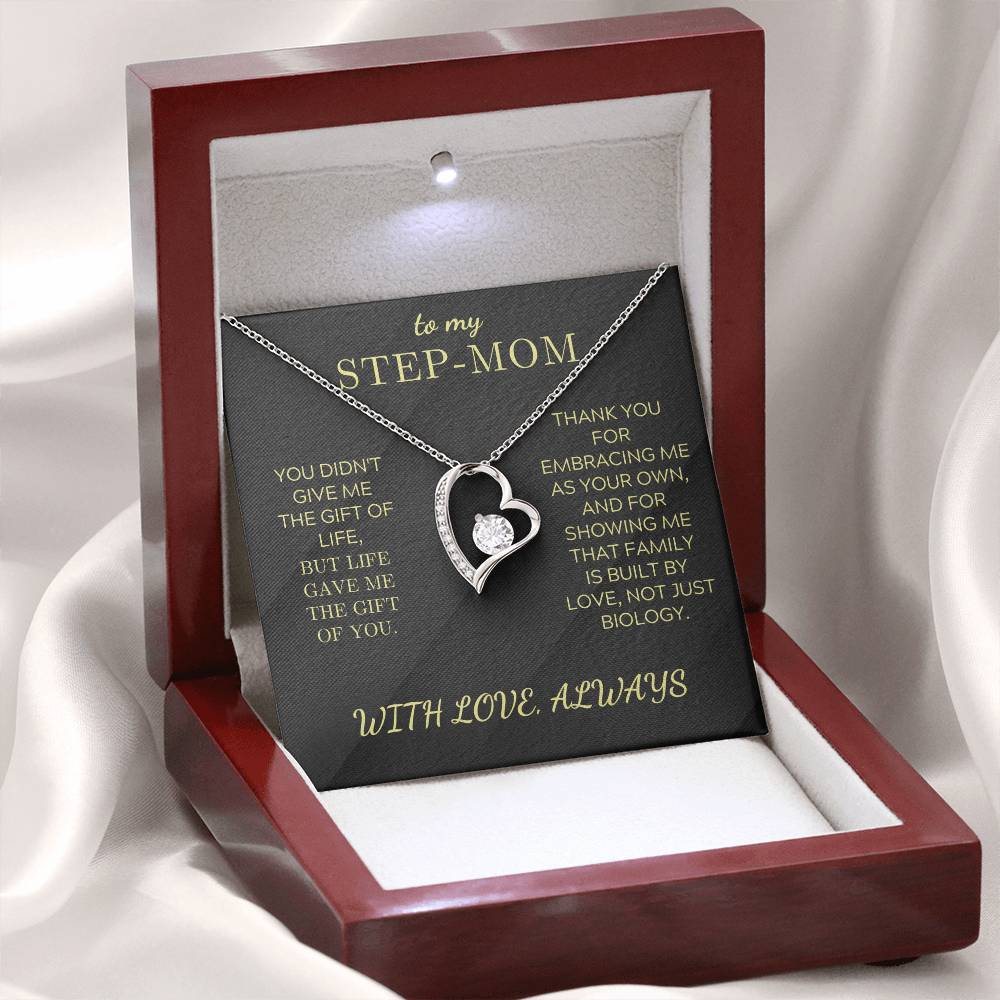 Heart pendant necklace with white gold tone finish and heart charm in red jewelry box