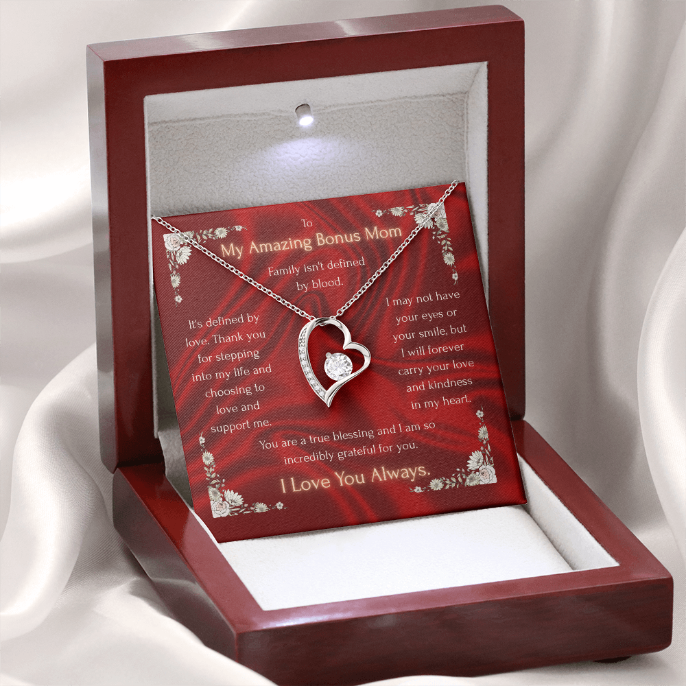 Necklace in red gift box with gold-tone heart pendant and chain, heart charm centered