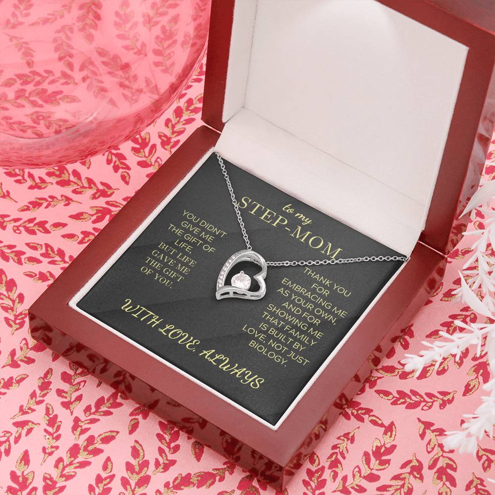 Heart pendant necklace with white gold tone finish and round zirconia stone in box
