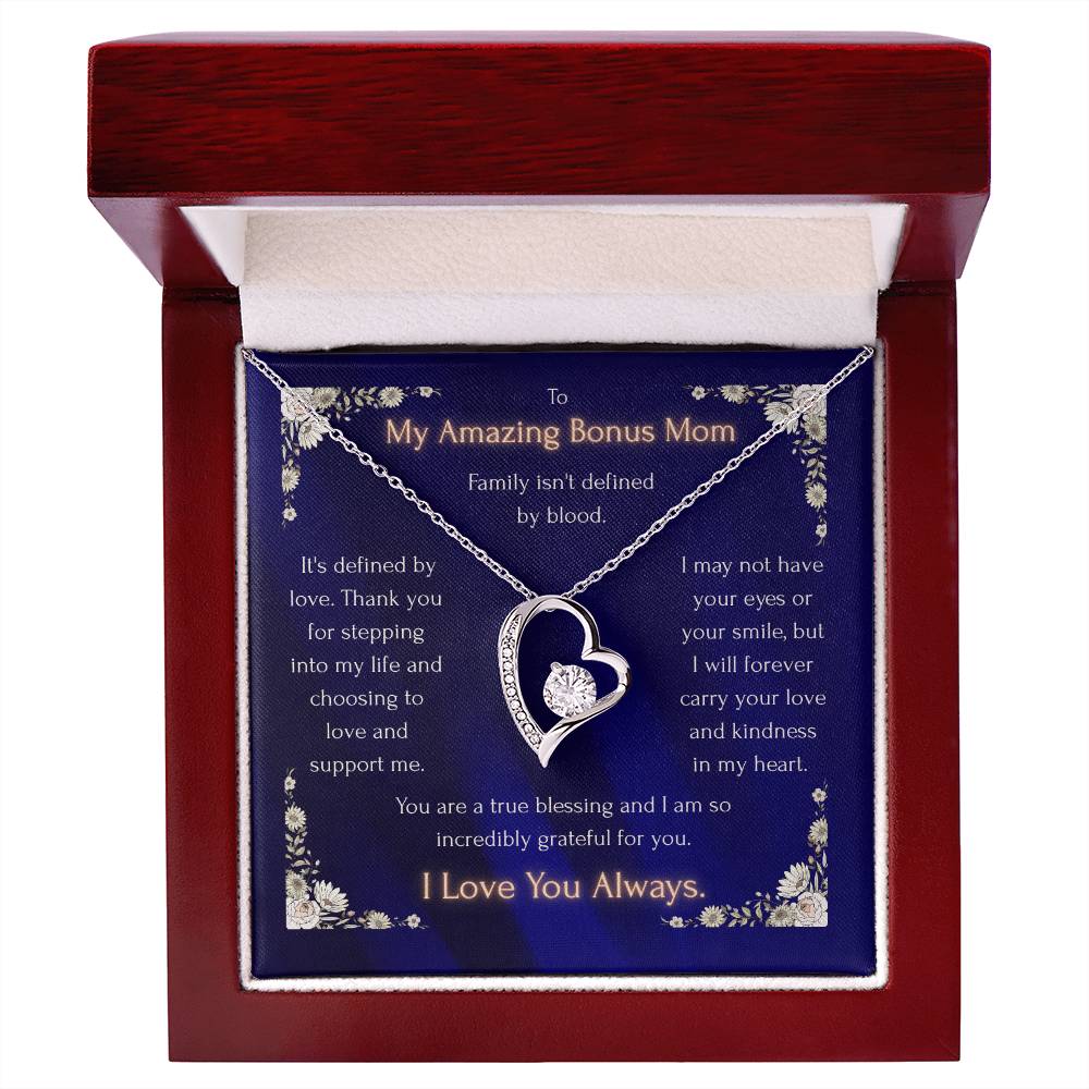 Blue heart pendant necklace in a red gift box, silver-toned heart with crystal center