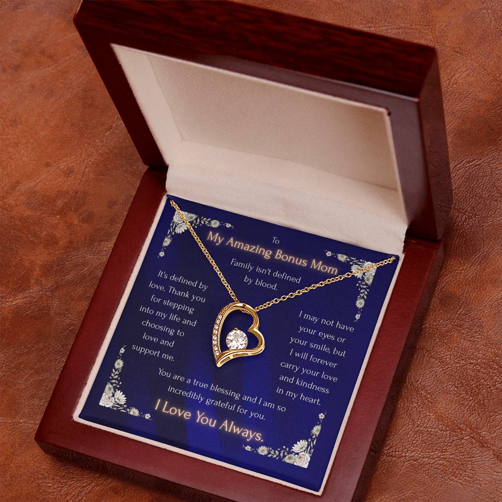 Blue heart pendant necklace in a gift box, gold-toned heart pendant on a chain