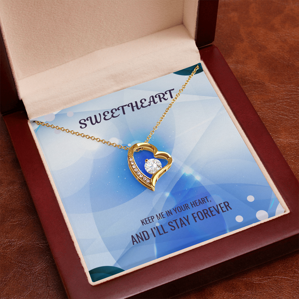 Gold heart pendant necklace in red gift box, blue enamel heart charm and card