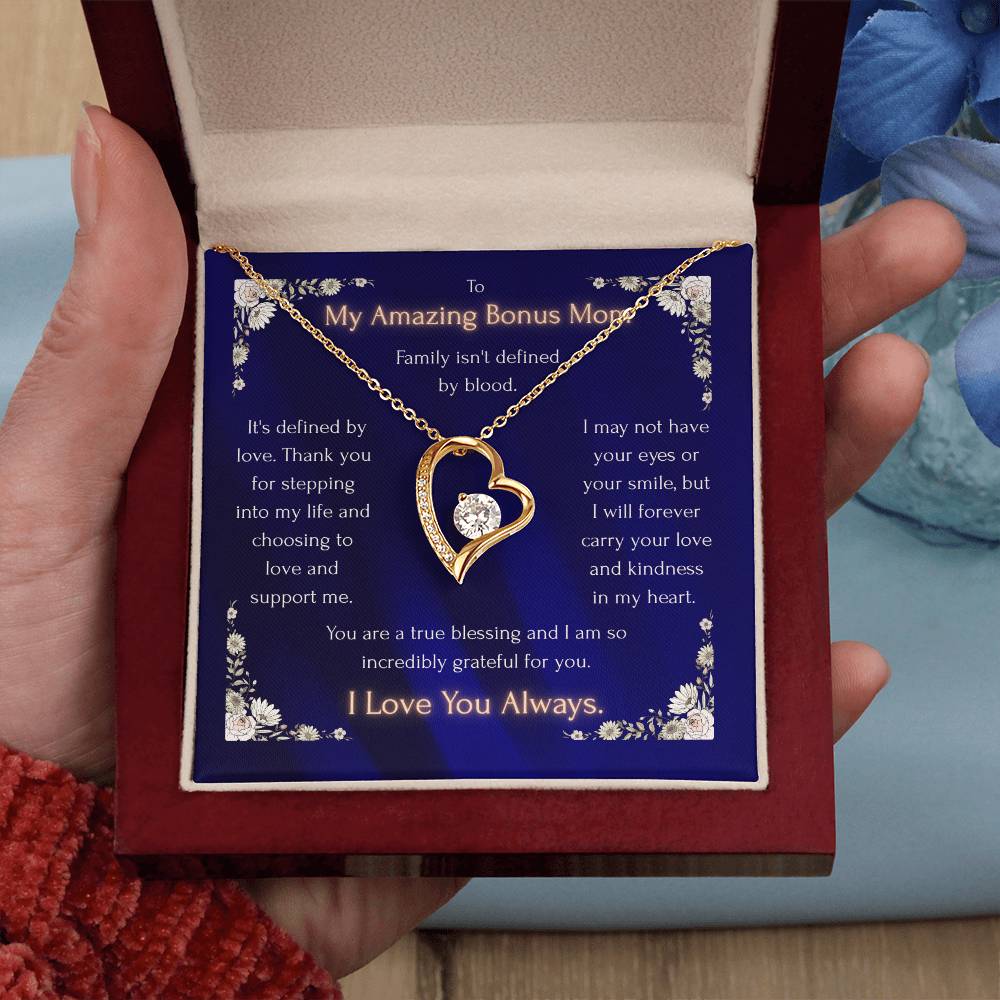 Gold-tone heart pendant necklace with blue enamel and round CZ stone detail