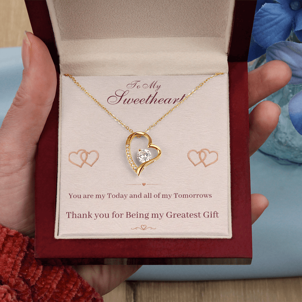 Heart necklace with gold-tone chain and heart pendant, shown on a “To My Sweetheart” card