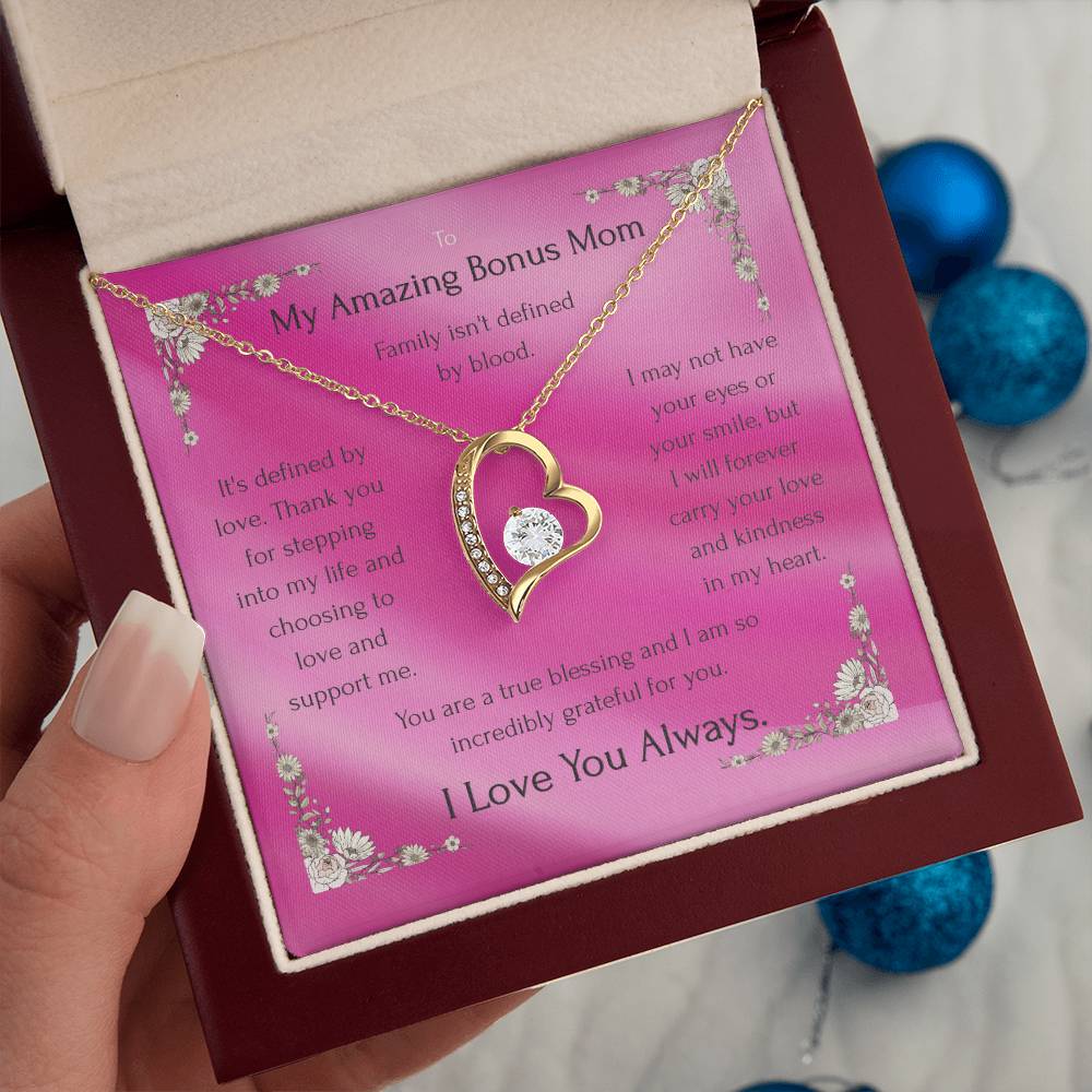 Rose gold heart pendant necklace with crystal accents on a fine chain