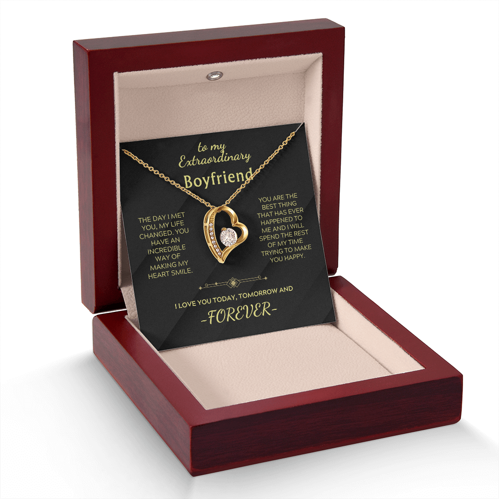 Set collana: ciondolo cuore in oro giallo con pietra centrale, in scatola aperta
