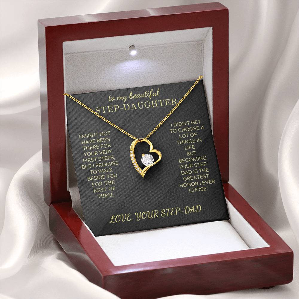 Gold-tone heart pendant necklace with clear center stone on short chain, in gift box