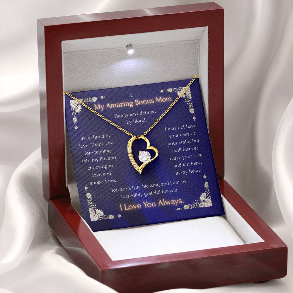 Gold heart pendant necklace with blue message card in red gift box