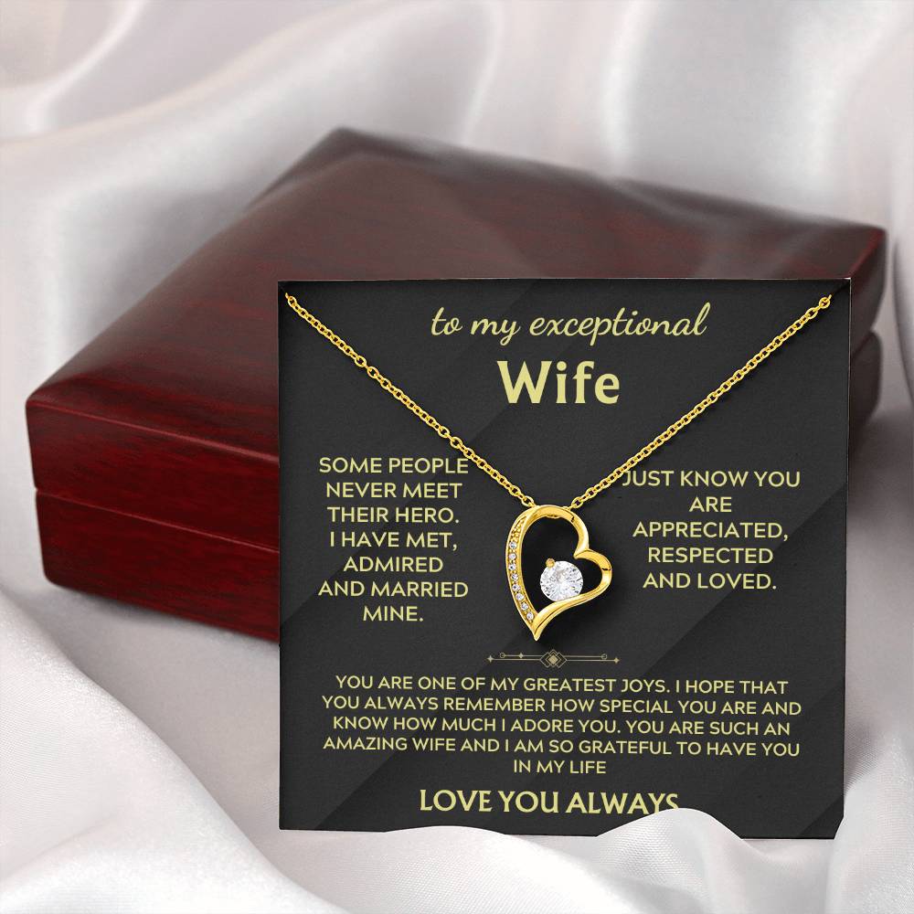 Gold-tone heart pendant necklace with clear CZ halo on chain