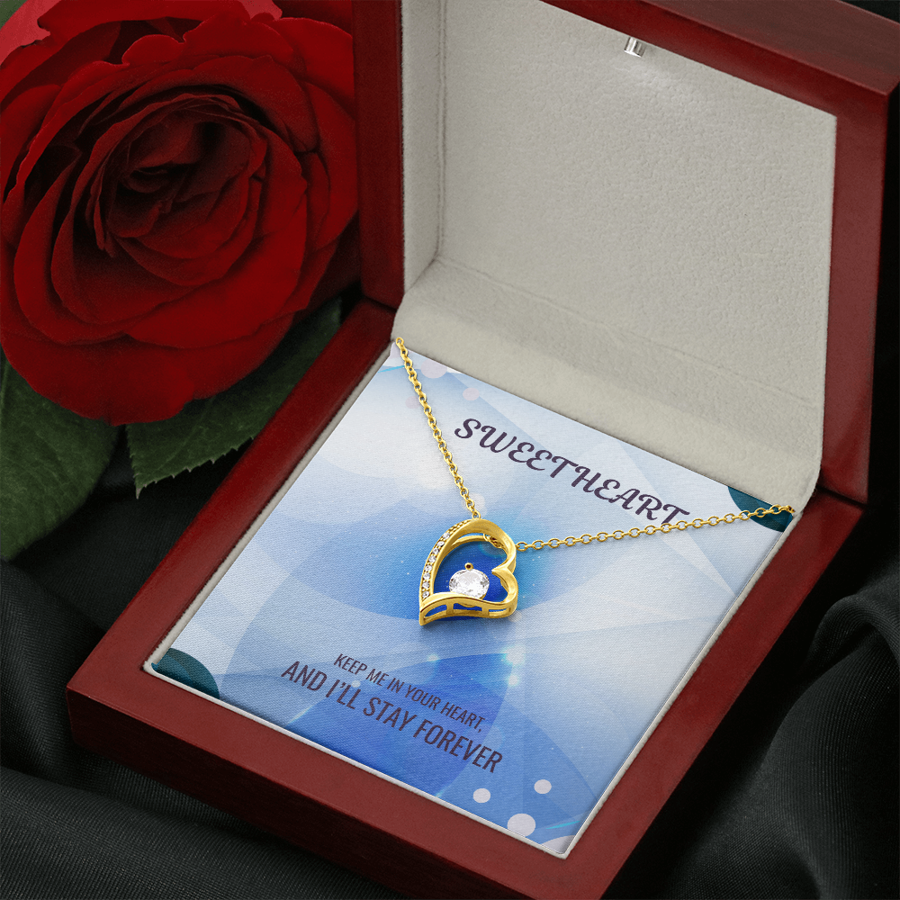 Gold heart pendant necklace in red gift box with rose and sentimental message card