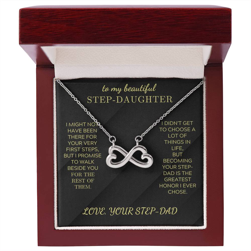 Silver infinity heart pendant necklace on black velvet card in gift box