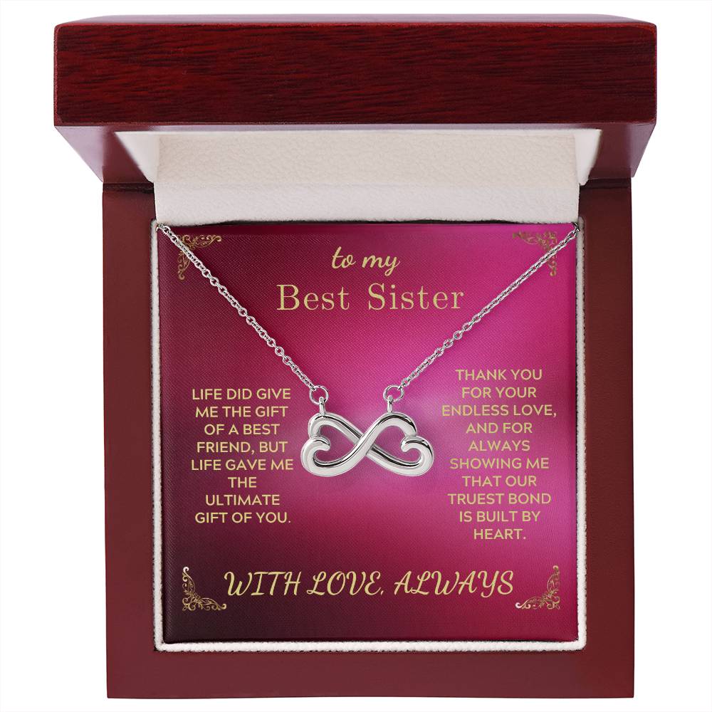 Silver-tone infinity heart pendant necklace in open gift box with chain