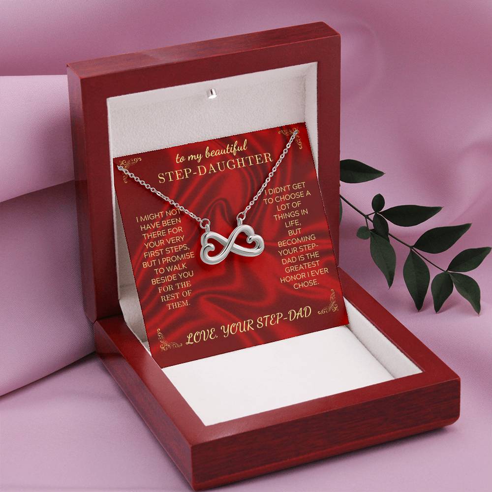 Silver heart-infinity necklace card set inside an open red gift box