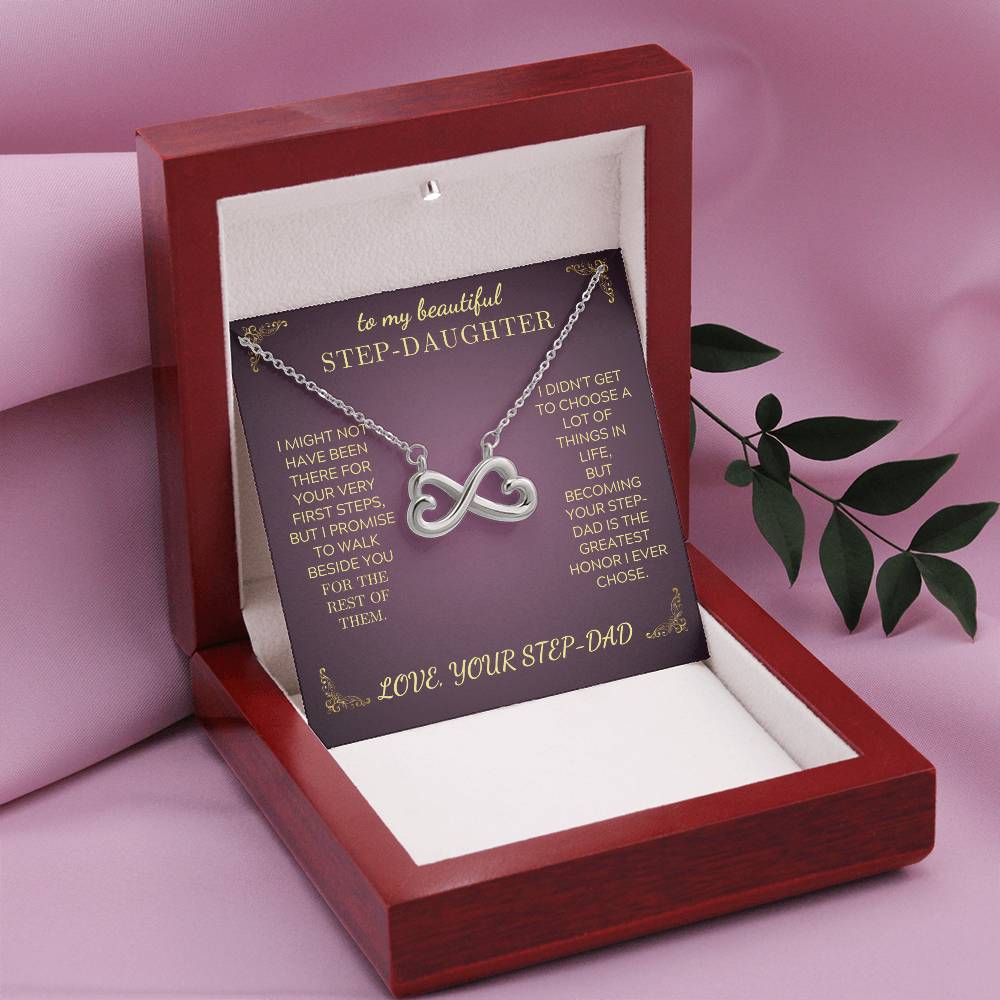 Silver infinity heart pendant necklace displayed in an open gift box