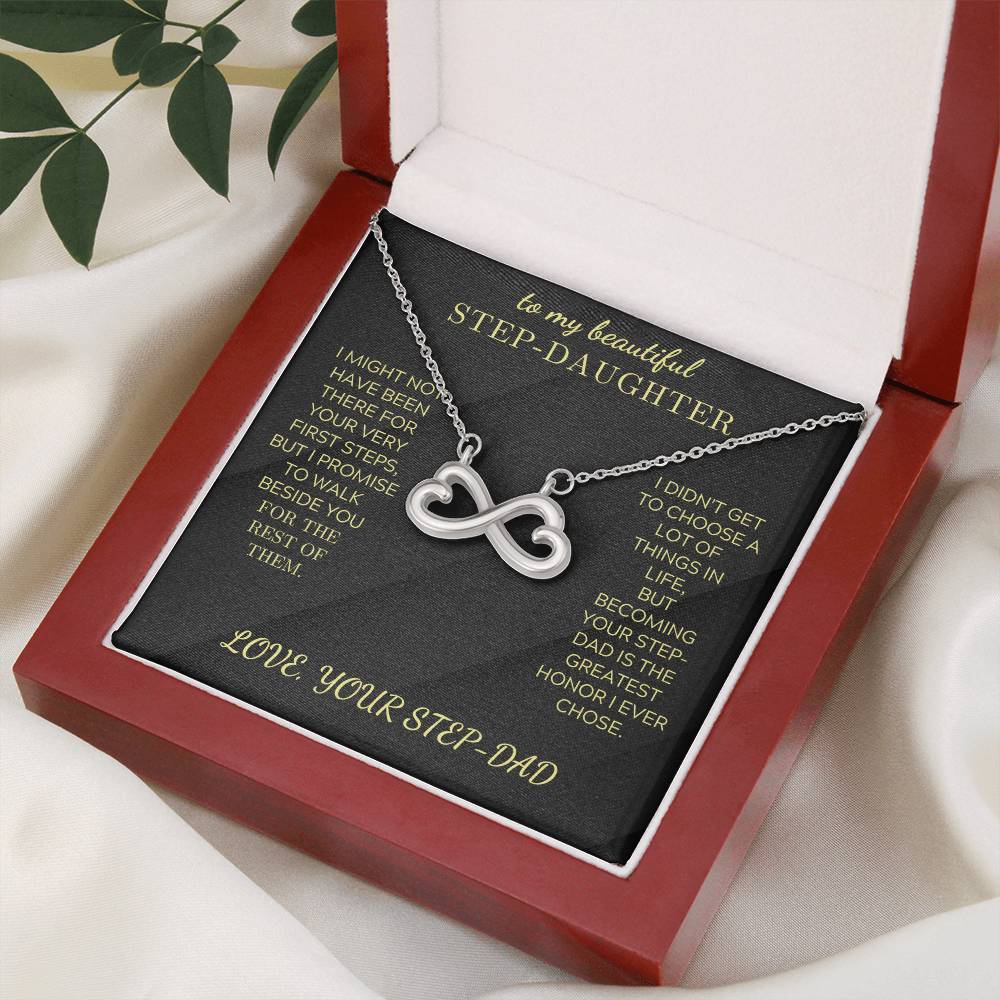 Silver infinity heart pendant necklace on black velvet card inside open gift box
