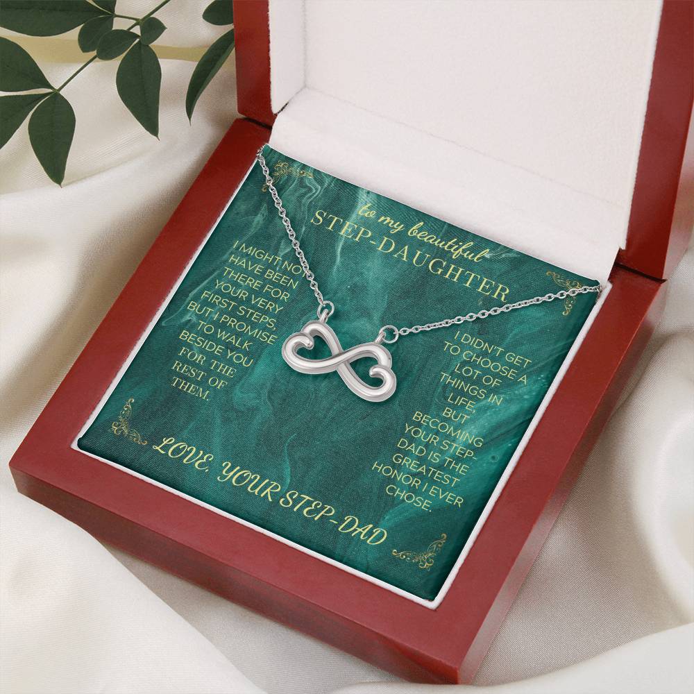 Endless Love necklace with silver infinity-heart pendant on green gift card inside open box