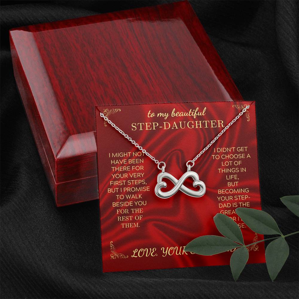 Silver heart-infinity pendant necklace in a red gift box with hinged lid