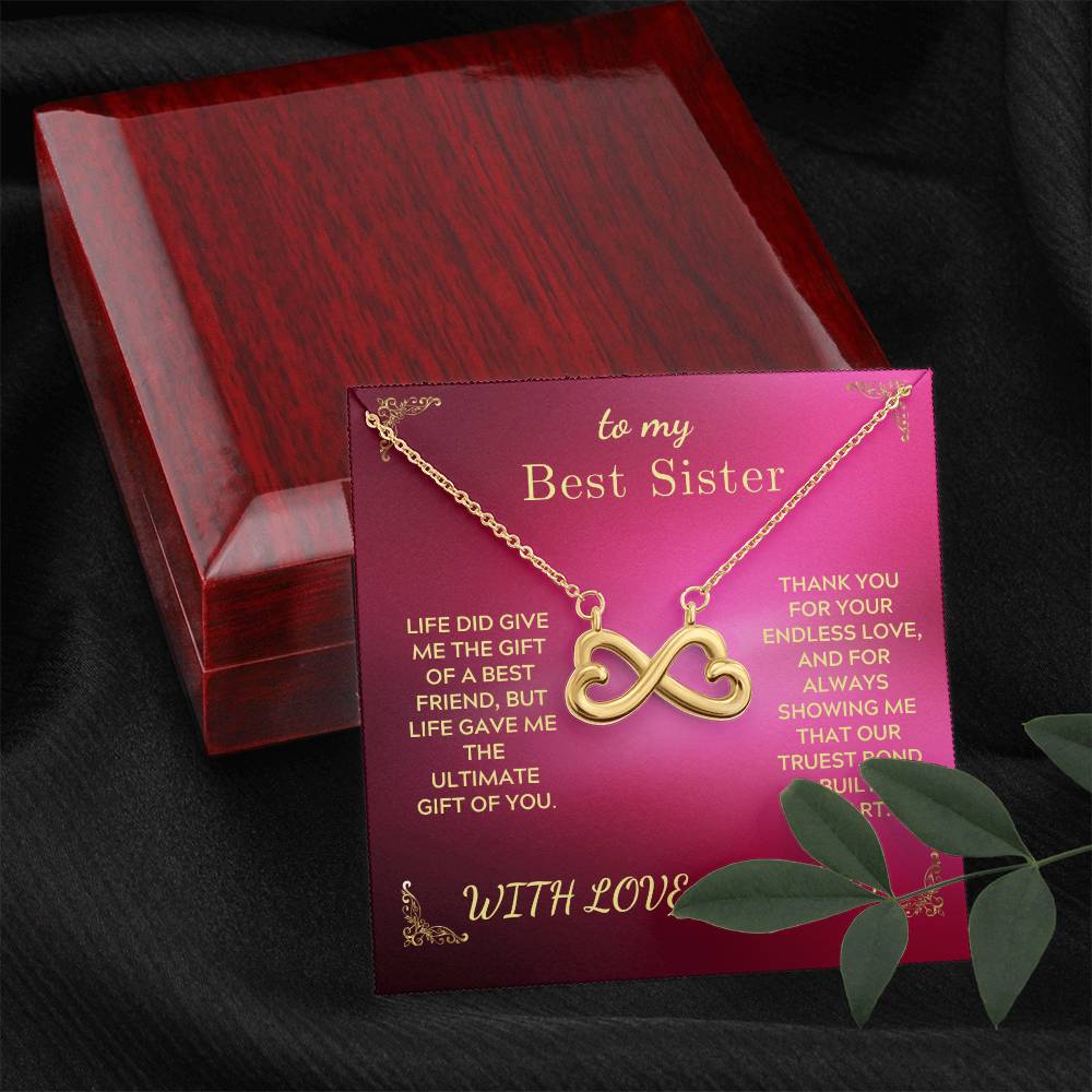 Gold-tone infinity heart pendant necklace in closed gift box with card