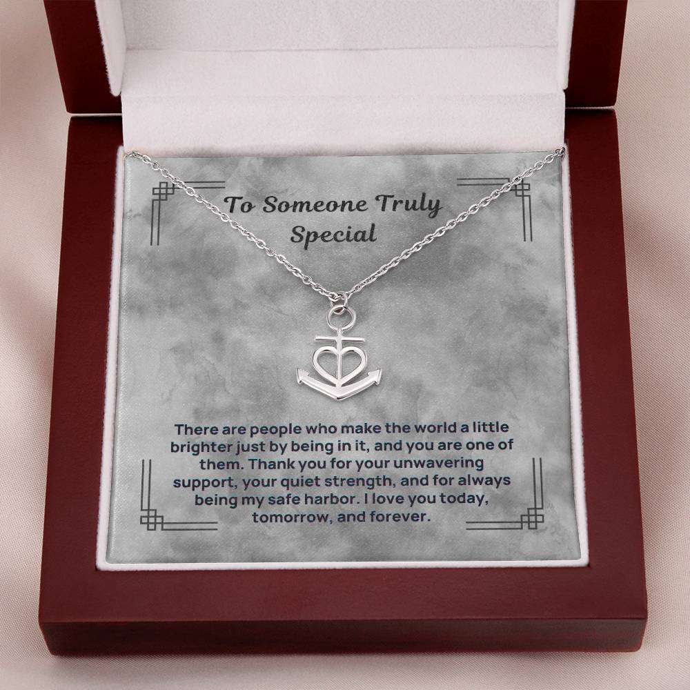 Silver anchor and heart pendant necklace in a red gift box