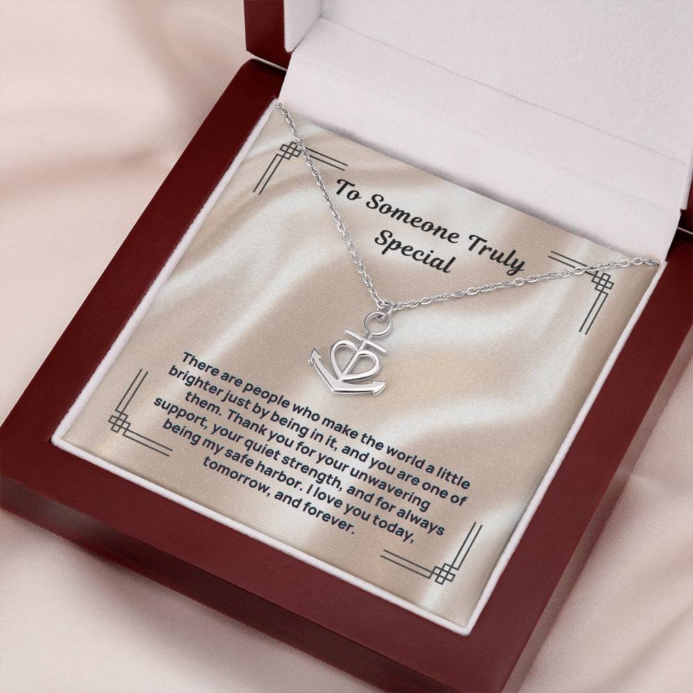 Silver anchor-and-heart pendant necklace displayed in gift box with card insert