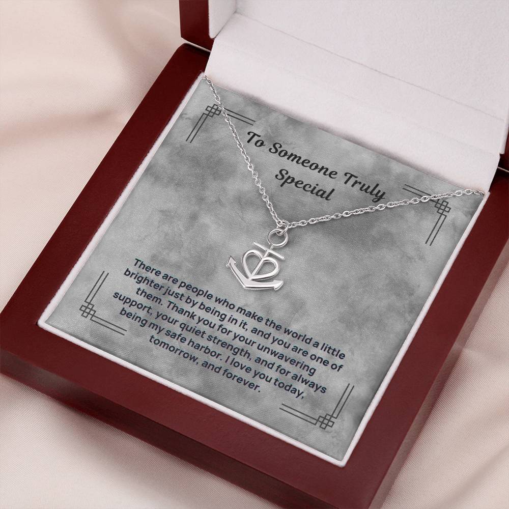 Silver anchor and heart pendant necklace in a red gift box