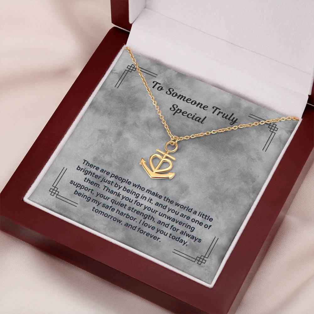 Gold-tone anchor and heart pendant necklace in a red gift box