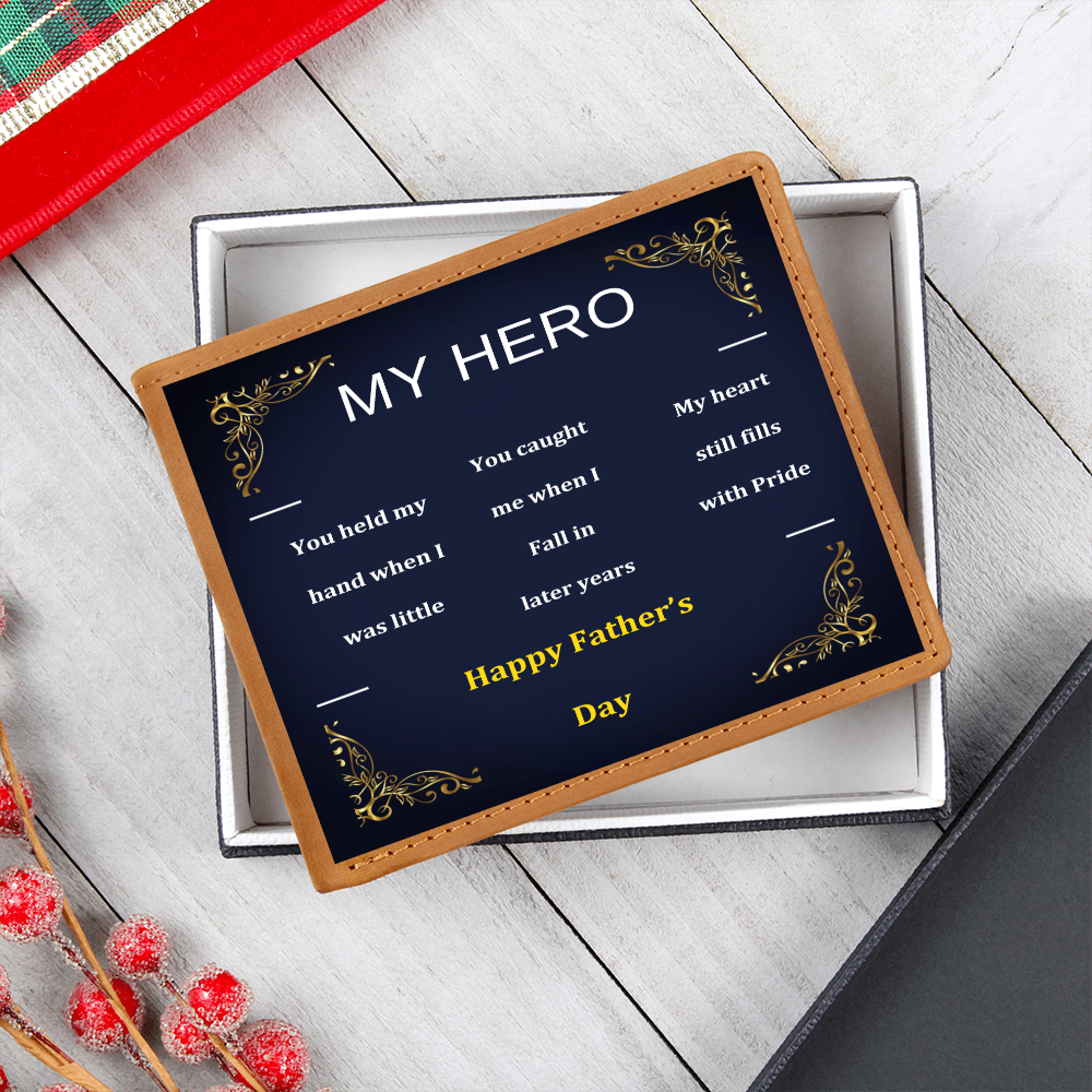 Brown leather wallet in a box with navy “MY HERO” design and gold trim