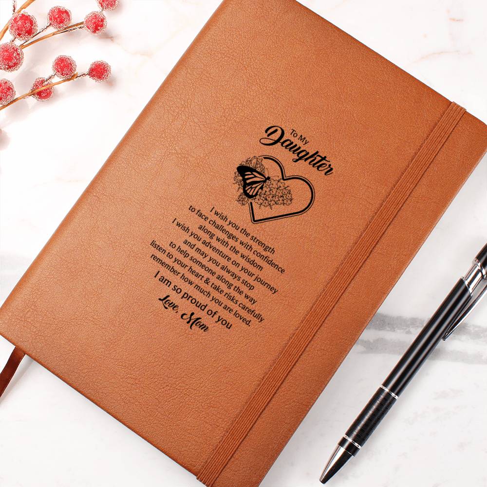 Orange-brown journal notebook with heart-and-butterfly quote and ribbon bookmark
