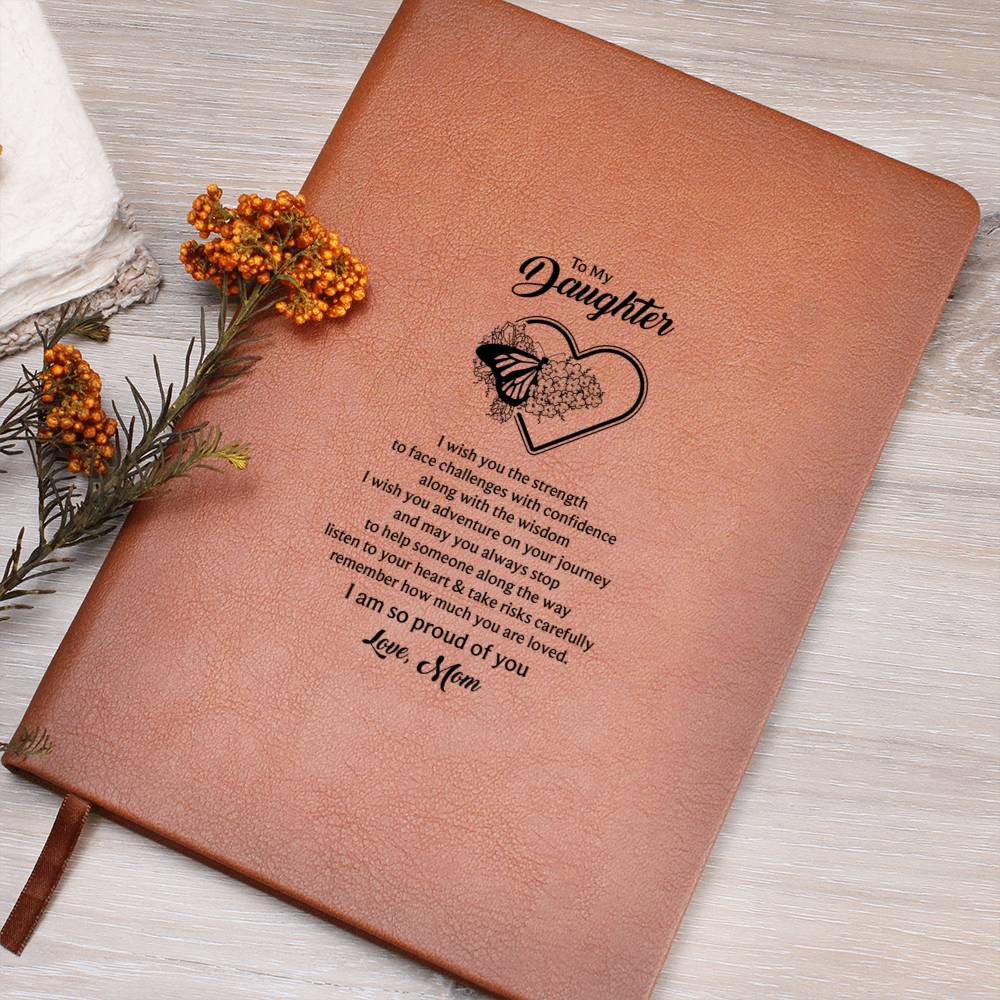 Burnt orange journal notebook with heart-and-butterfly quote printed on cover