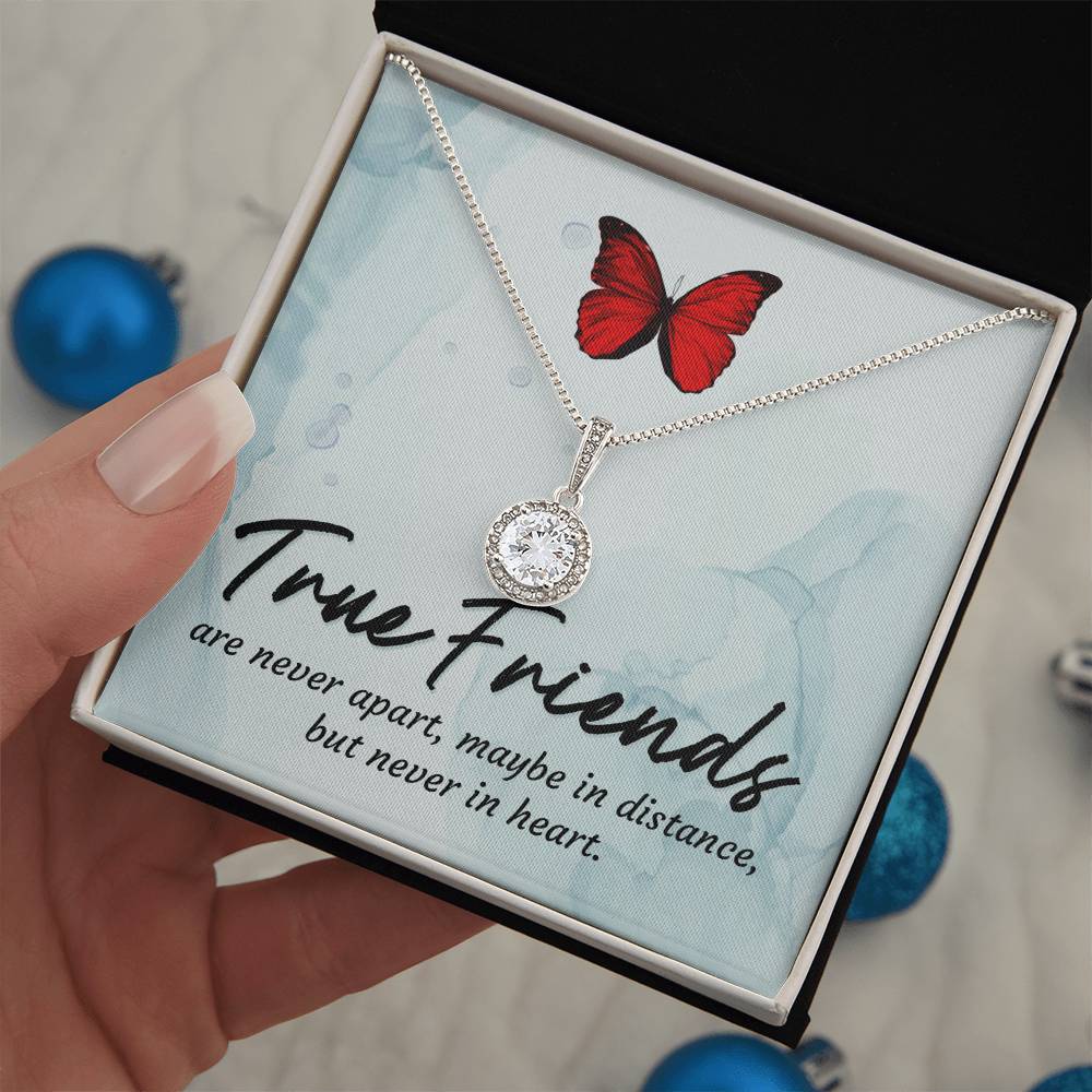 Round halo pendant necklace held in gift box with silver-tone chain