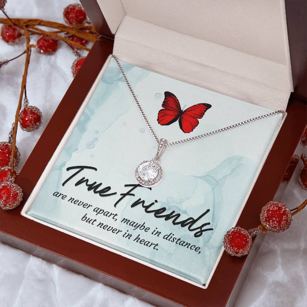 Round halo pendant necklace in open gift box with silver-tone chain