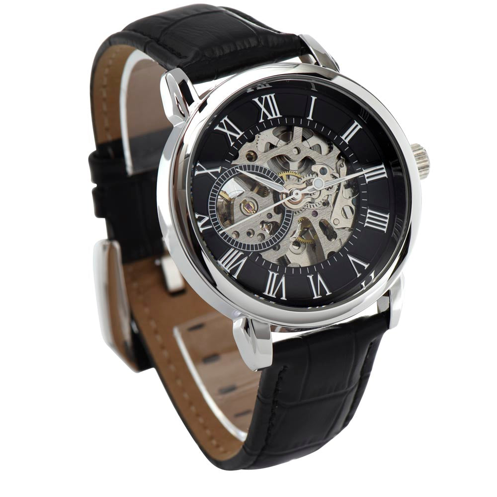 Black leather open-work wristwatch with silver case and roman numeral dial, side view