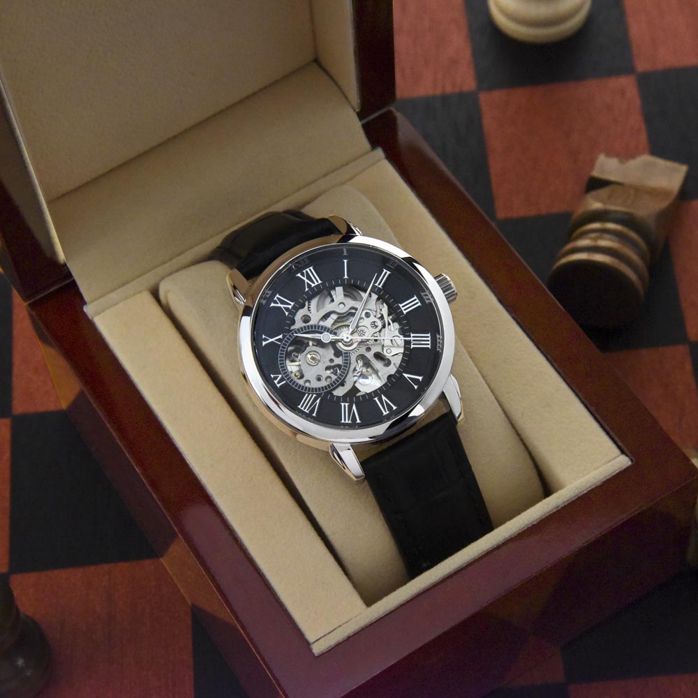 Open-work wristwatch in gift box, black dial with Roman numerals and silver case