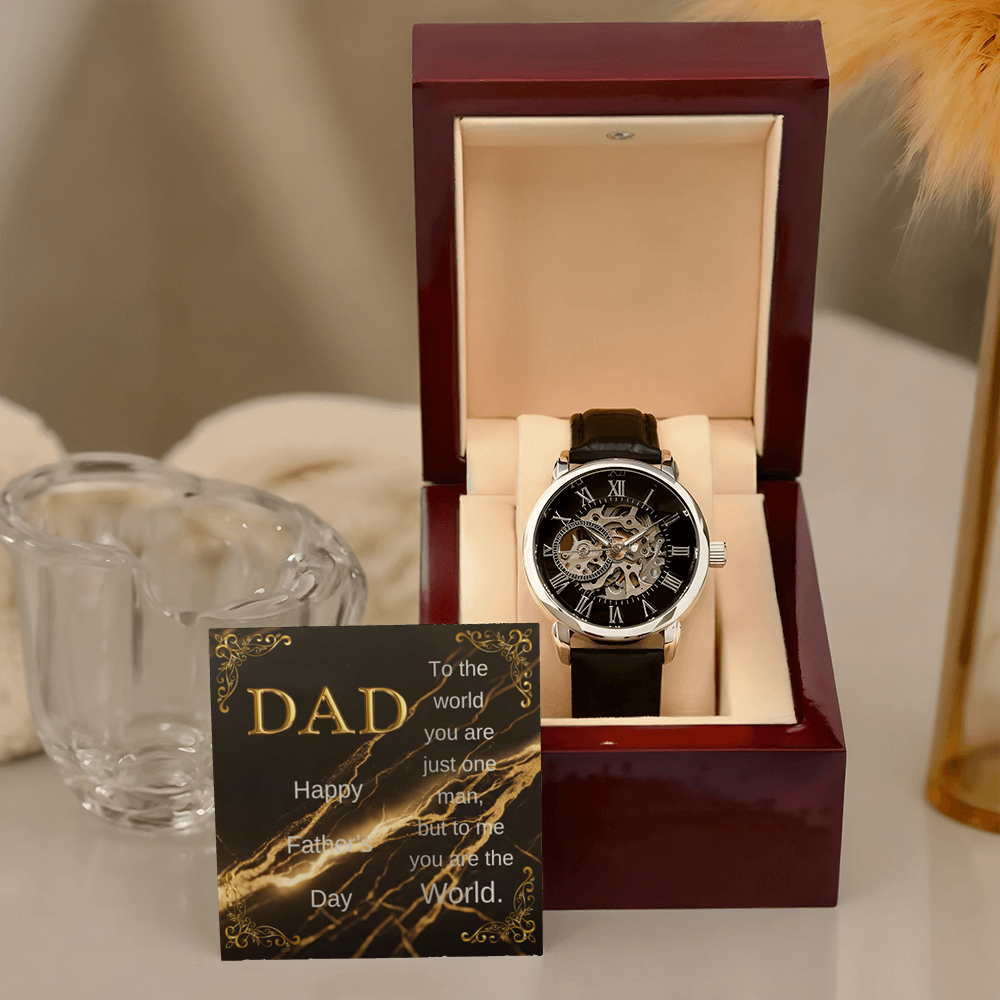 Wood watch box with DAD message card and black leather skeleton wristwatch, upright