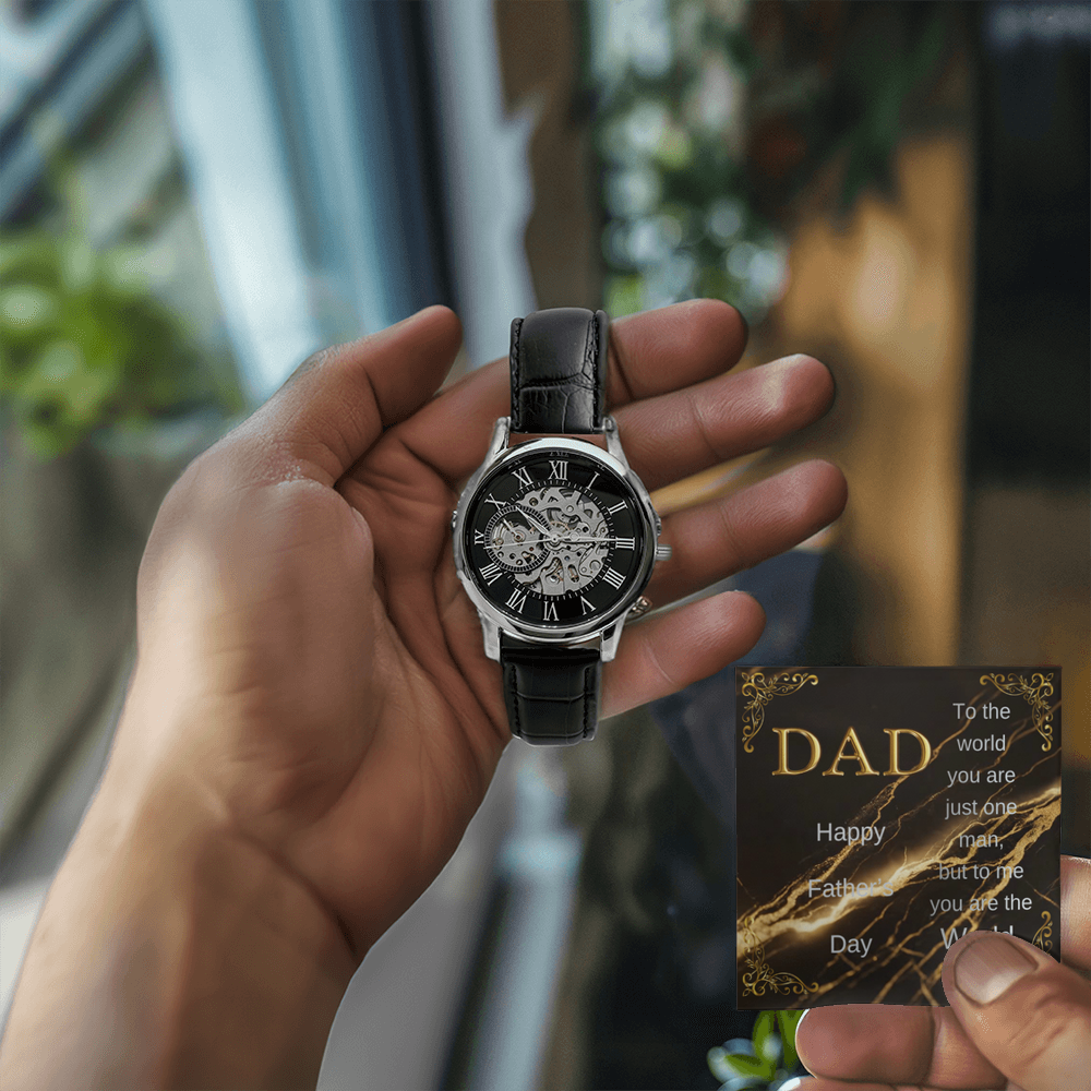 Black leather open-work wristwatch held in hand, with exposed mechanical dial