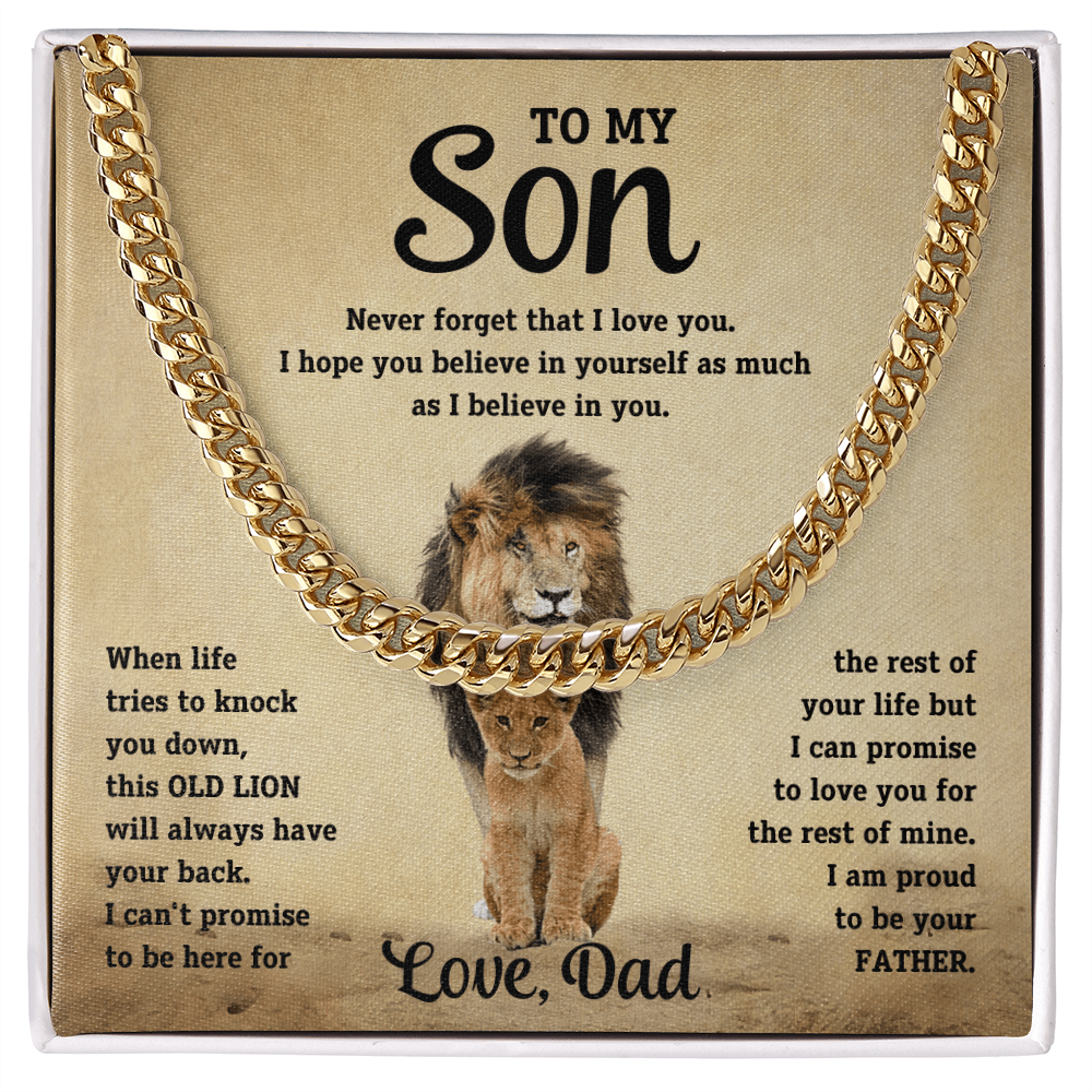 Gold-tone curb-link necklace in display box with lion portrait and “Love, Dad”