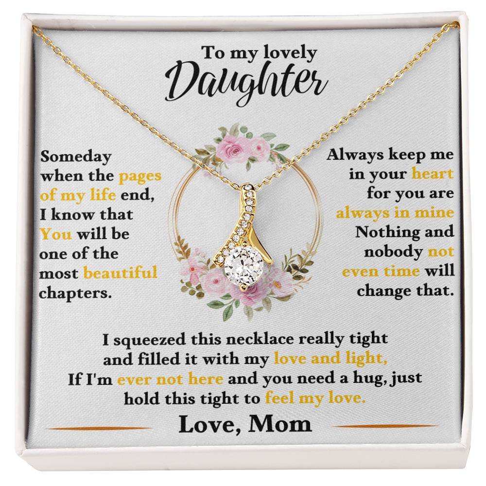 Gold-tone daughter necklace in white gift box, floral heart and dangling teardrop charm